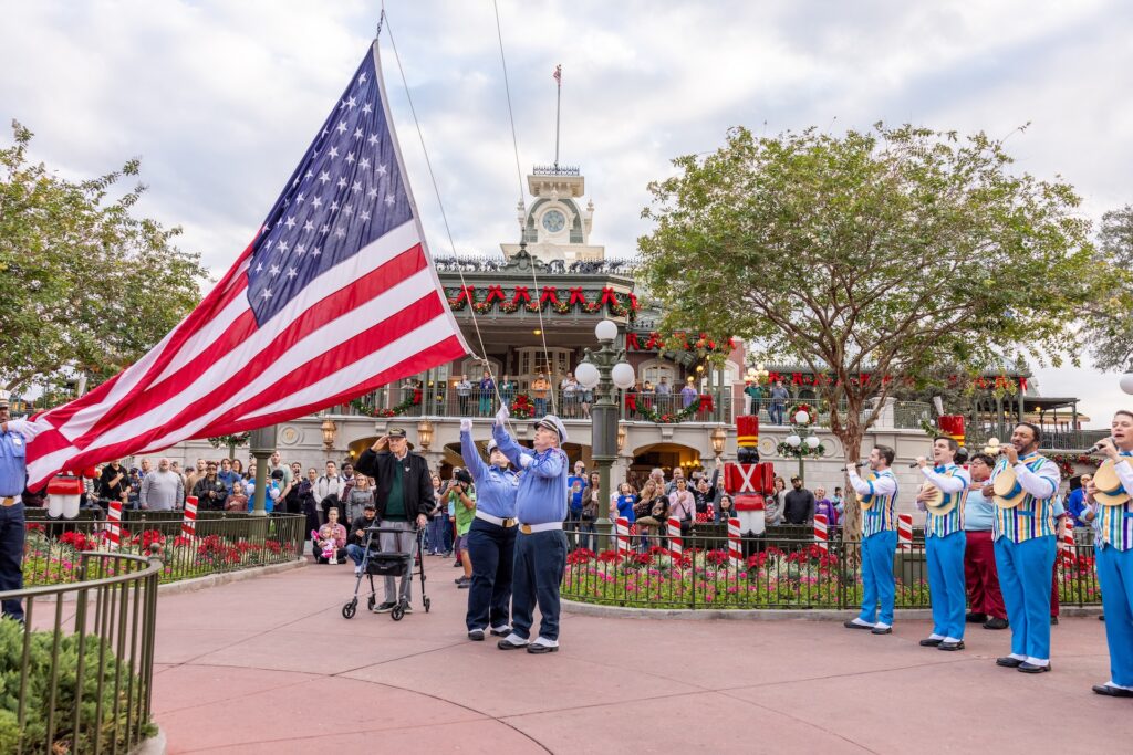 Military Veteran at Disney World Saluting the American Flag