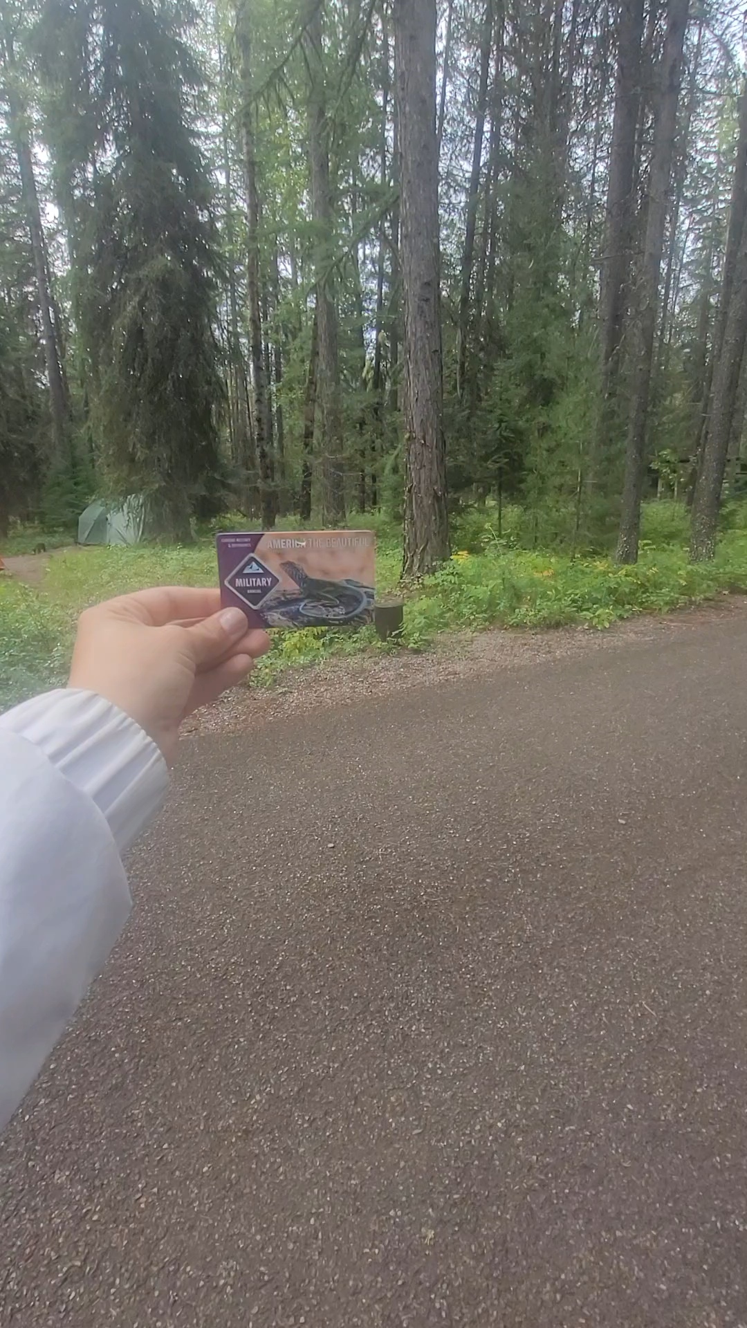 America the Beautiful military pass saved to Apple Wallet on a phone for offline national park entry